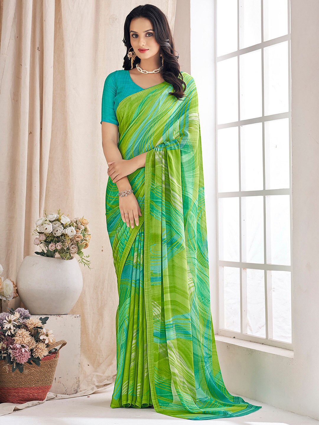 

Mitera Abstract Printed Pure Chiffon Bagru Saree, Green