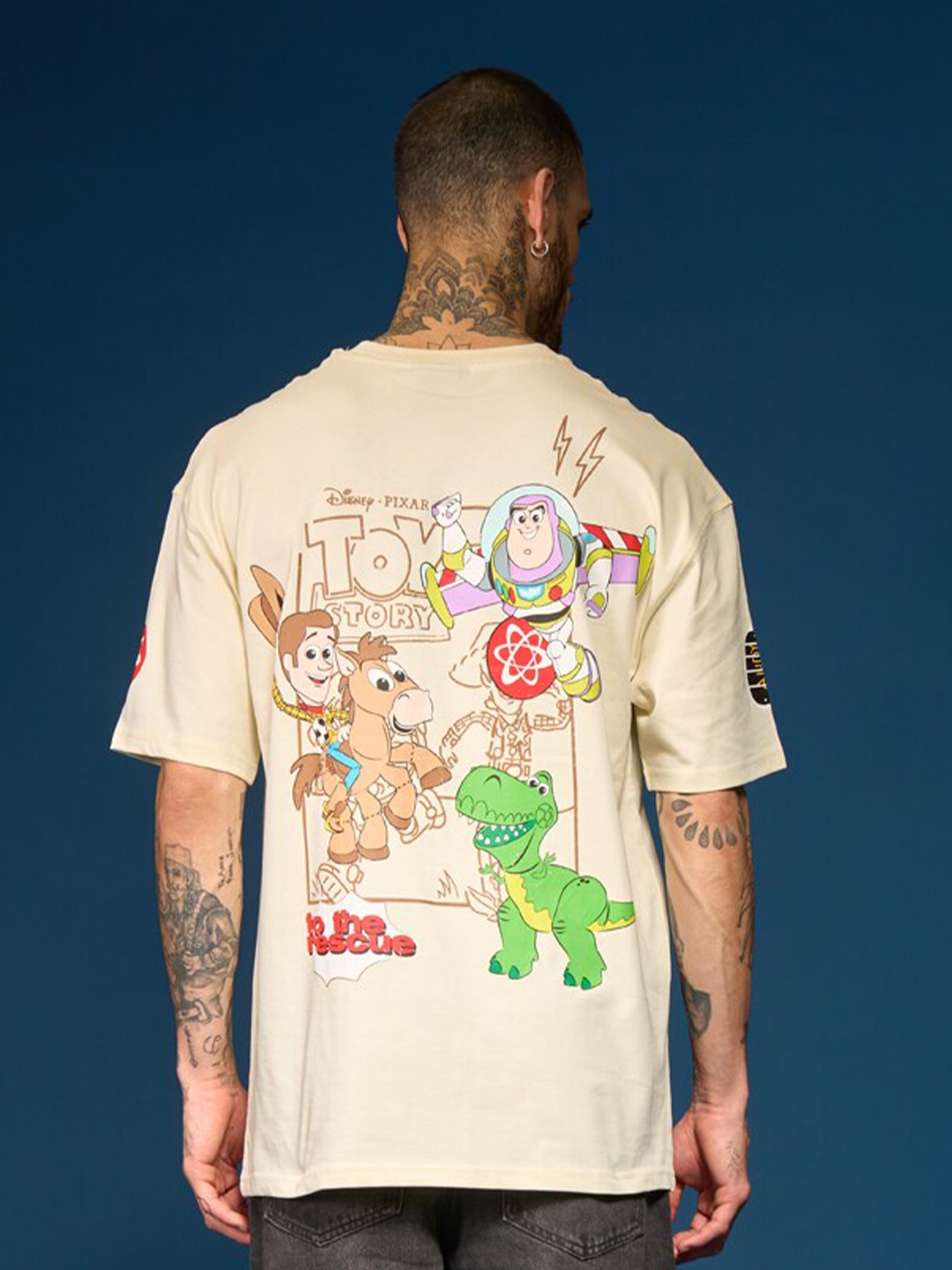 

Bonkers Corner Conversational Printed Cotton Round Neck Oversized T-shirt, Beige