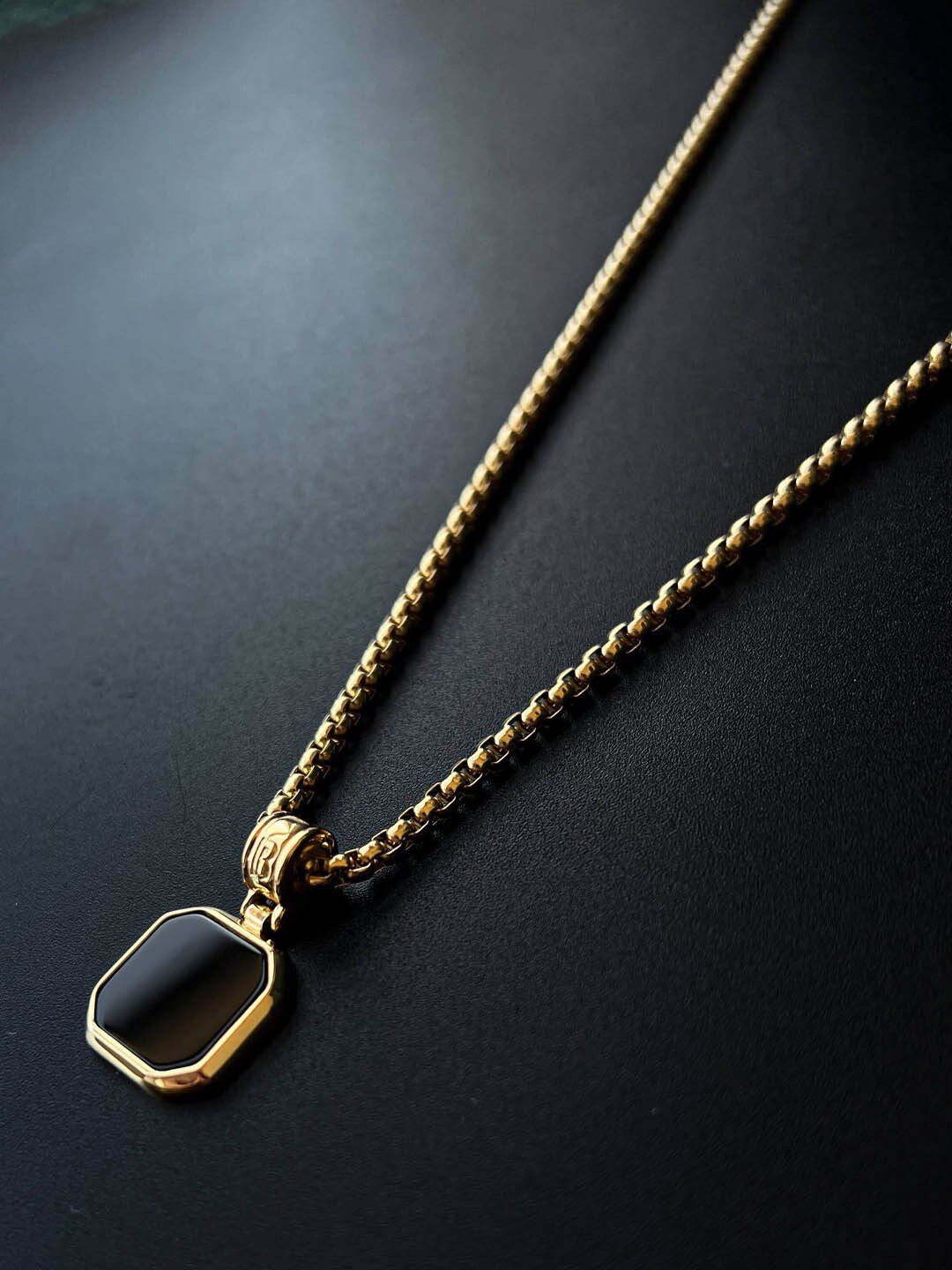 

Krelin Gold-Plated Square Shaped Pendant With Chain