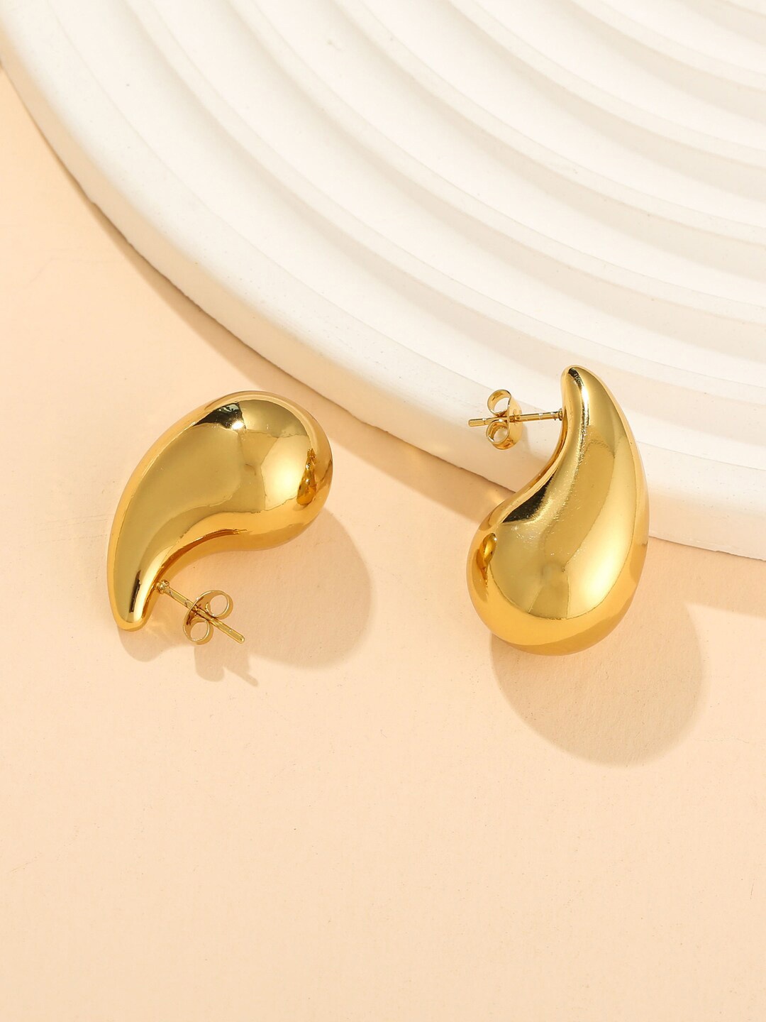 

Krelin Gold-Plated Teardrop Shaped Stainless Steel Studs Earrings