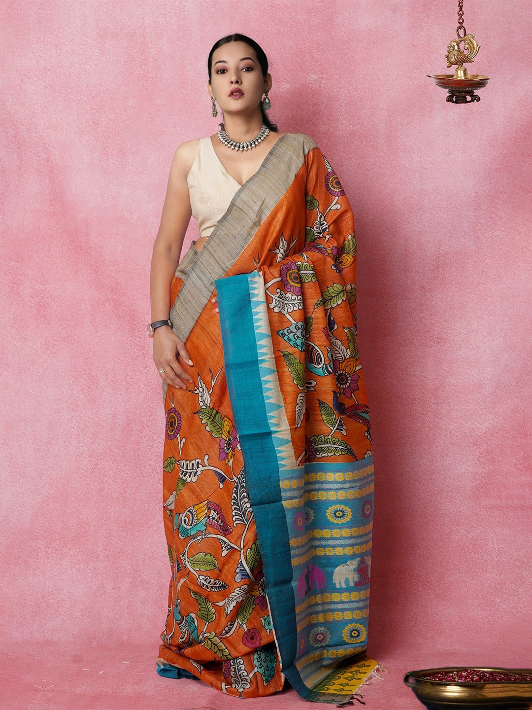 

Unnati Silks Kalamkari Printed Zari Pure Silk Handloom Tussar Saree, Orange