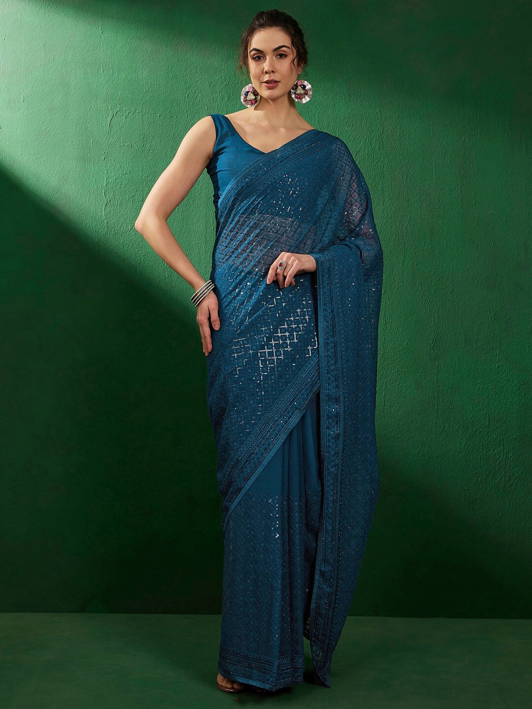 

Sangria Ethnic Motifs Embellished Pure Georgette Beads and Stones Sarees, Teal