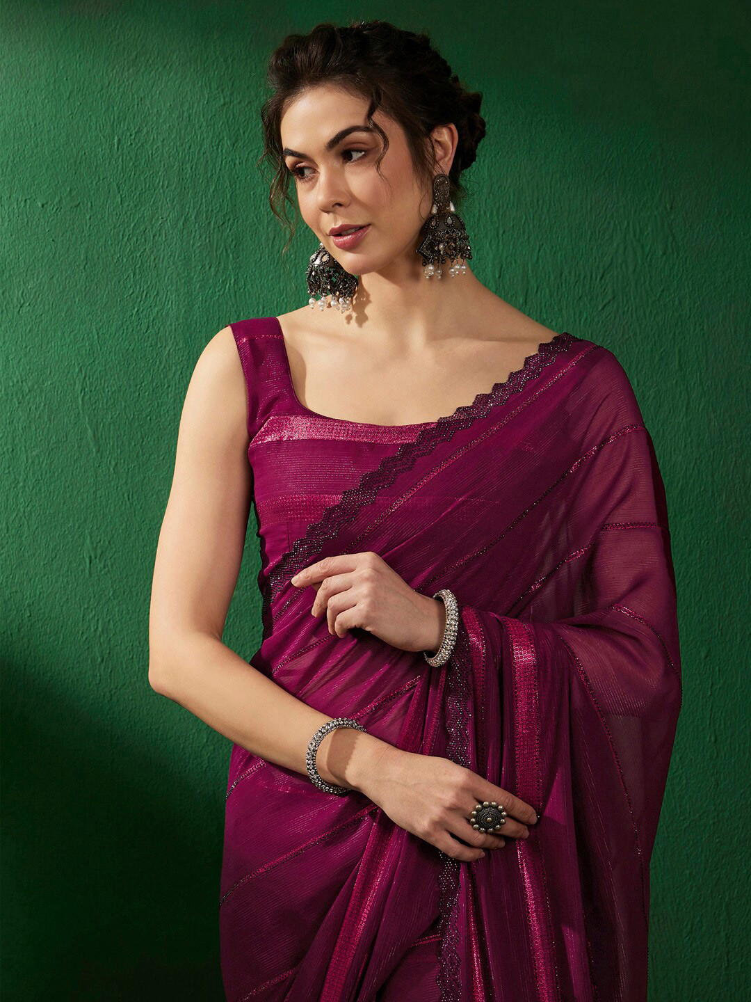 

Sangria Striped Embellished Pure Georgette Saree, Magenta