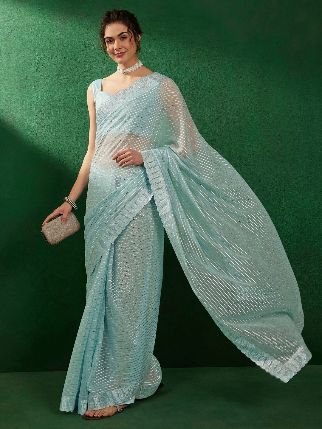 

Sangria Striped Embellished Pure Georgette Saree, Blue