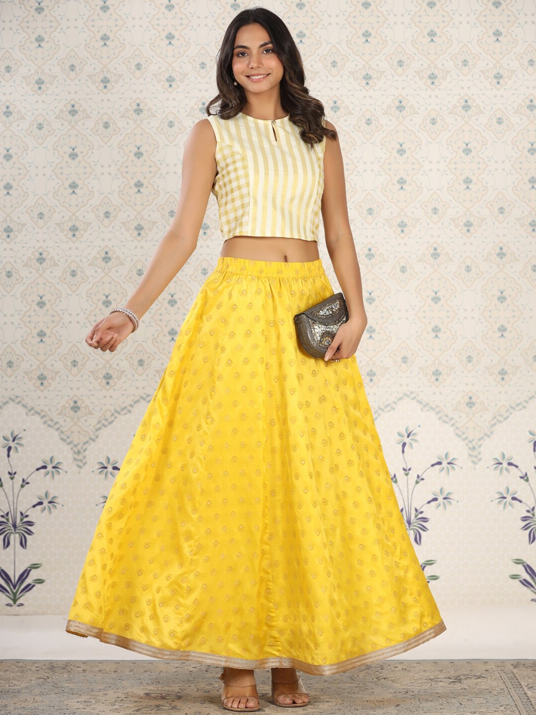 

Ode by House of Pataudi Yellow Butti Printed Flared Maxi Skirt