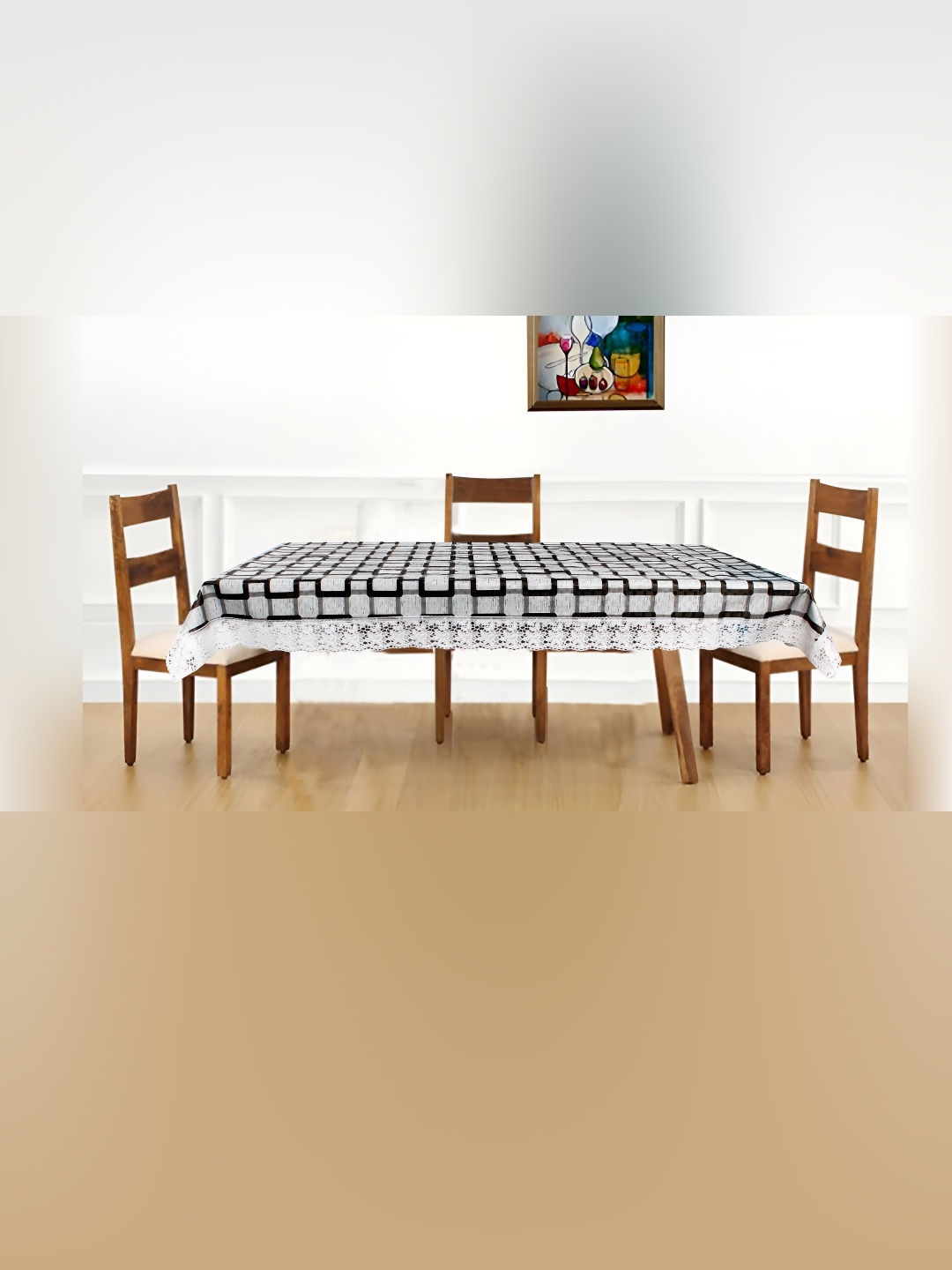 

Stylista Black & White Geometric Printed Waterproof 4 Seater Table Cover