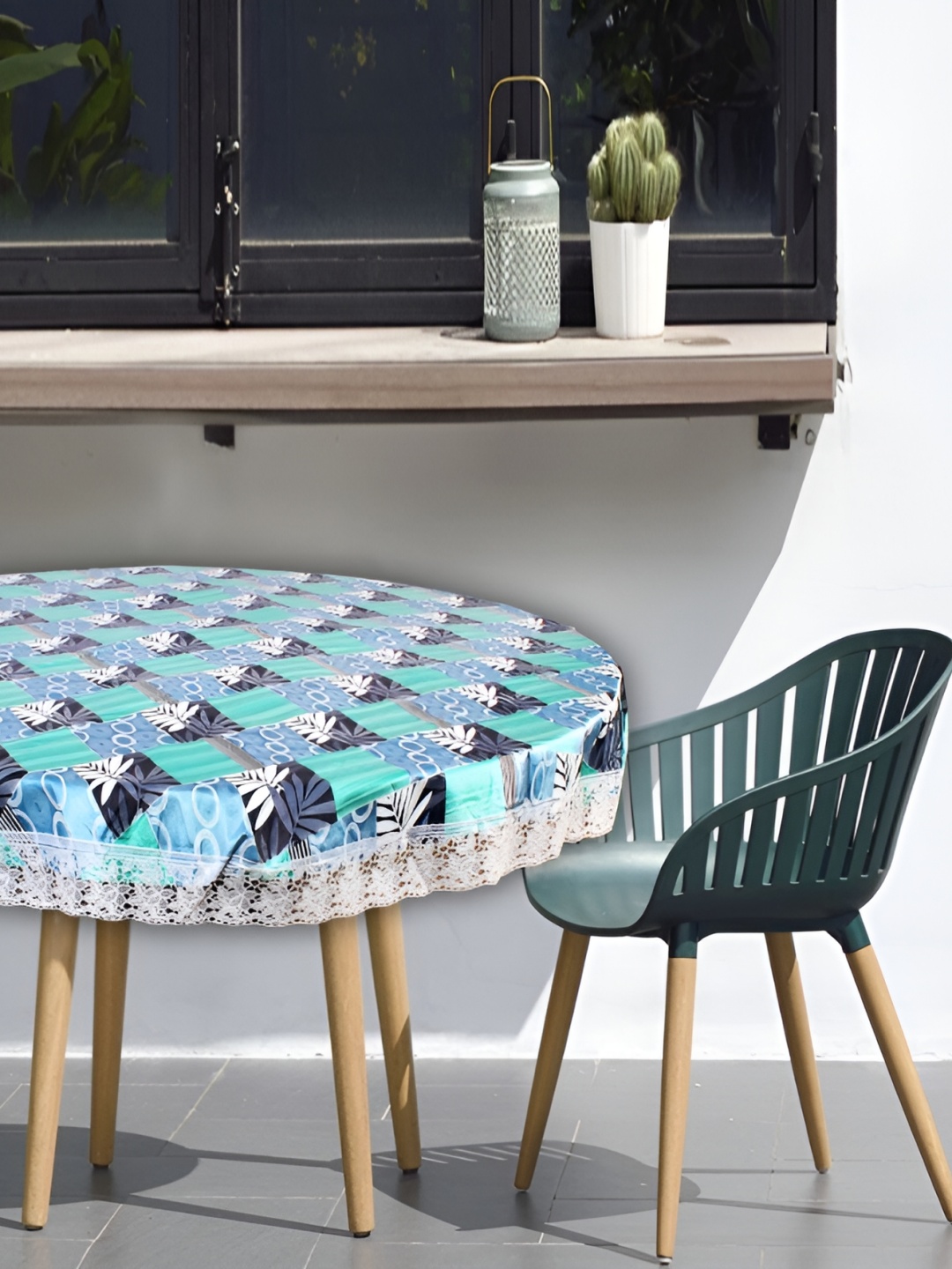 

Stylista Green & White Floral Waterproof Round 2-Seater Table Cover