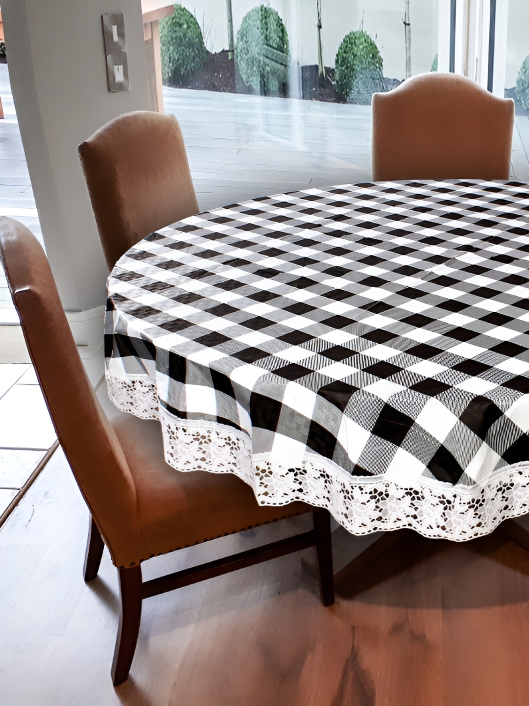 

Stylista Black & White Checked Waterproof Round 6 Seater Table Cover