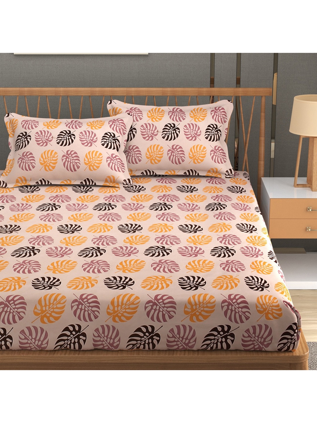 

Aura Peach & Black Floral 180 TC Queen Bedsheet With 2 Pillow Covers