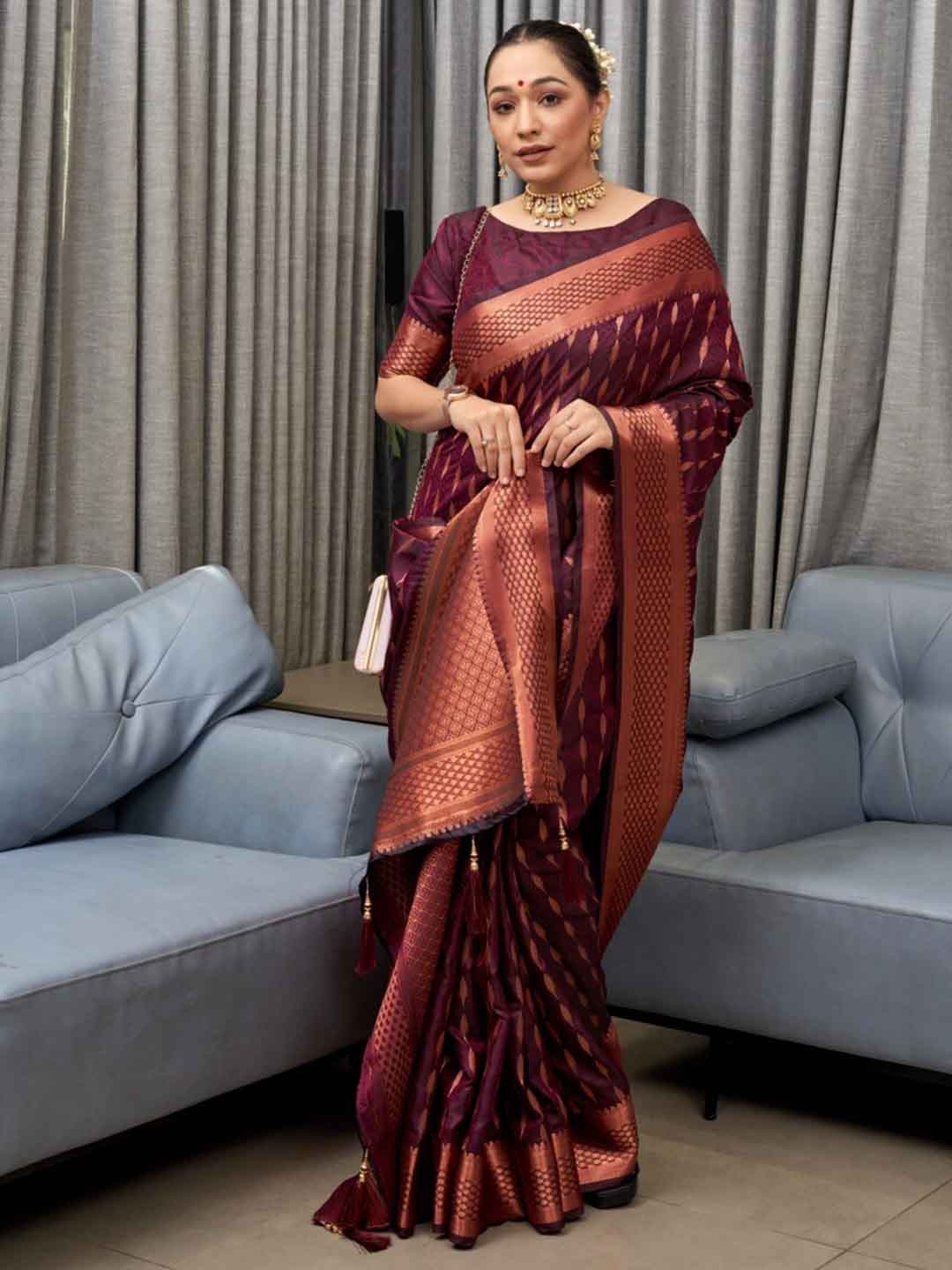

Mitera Maroon & Gold Toned Woven Design Zari Art Silk Saree