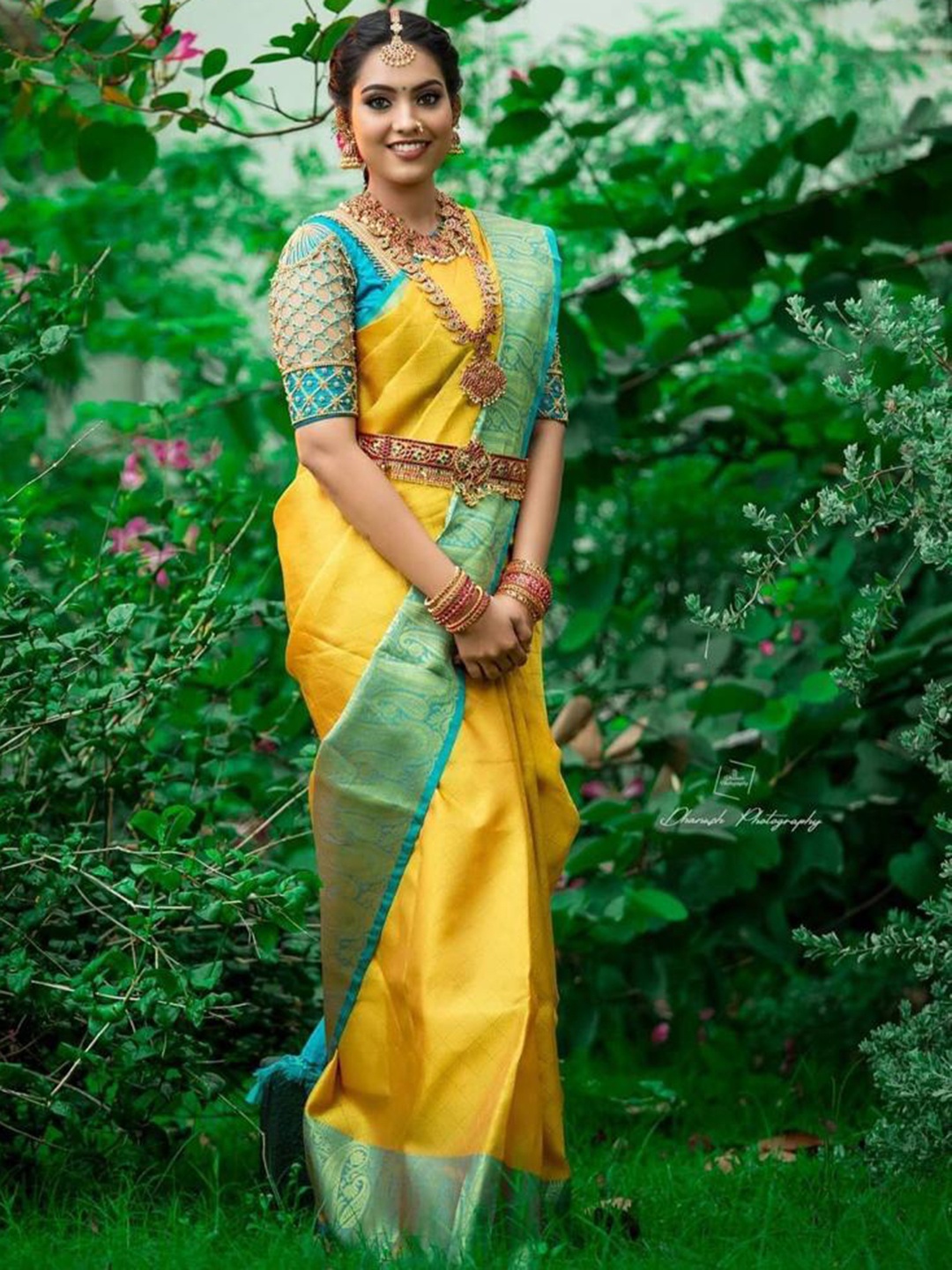 

Mitera Yellow & Blue Ethnic Motifs Woven Design Zari Art Silk Saree