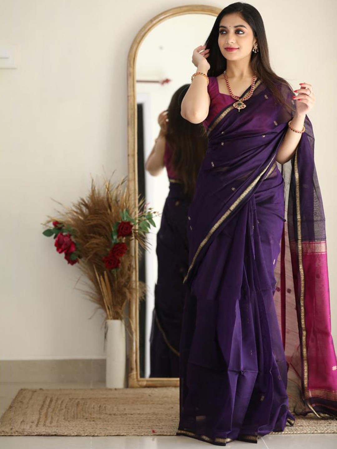 

Mitera Purple & Pink Woven Design Zari Art Silk Saree