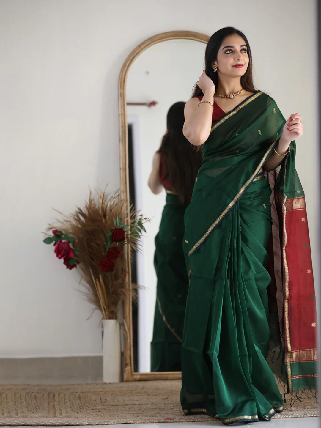 

Mitera Green & Red Ethnic Motifs Woven Design Zari Art Silk Saree