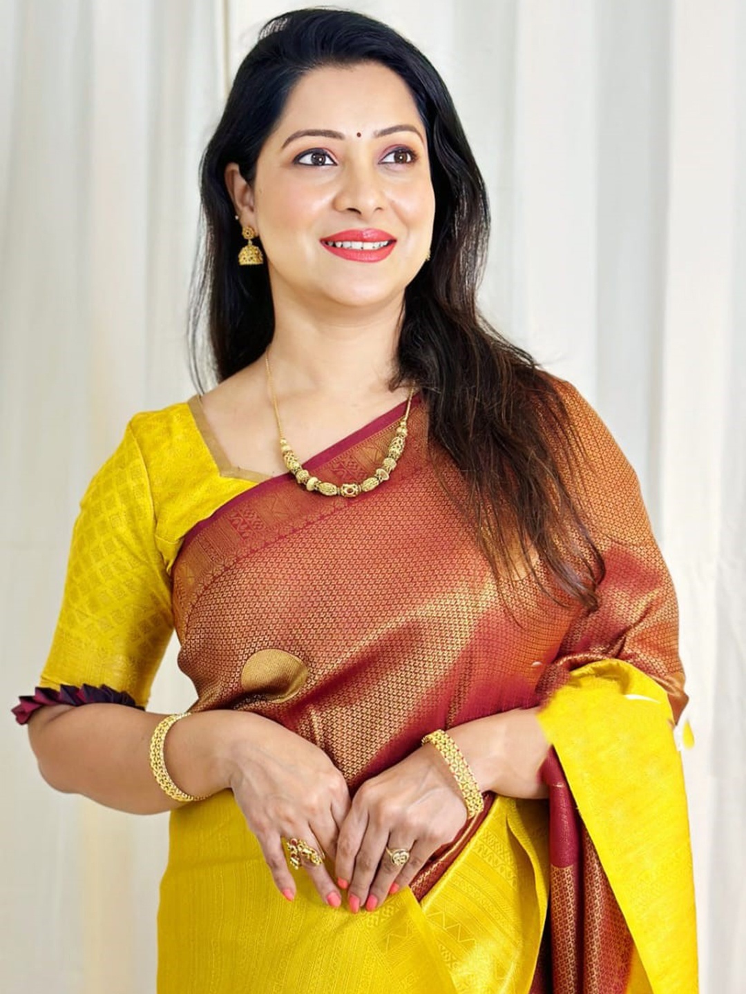 

Mitera Maroon & Yellow Woven Design Zari Art Silk Saree