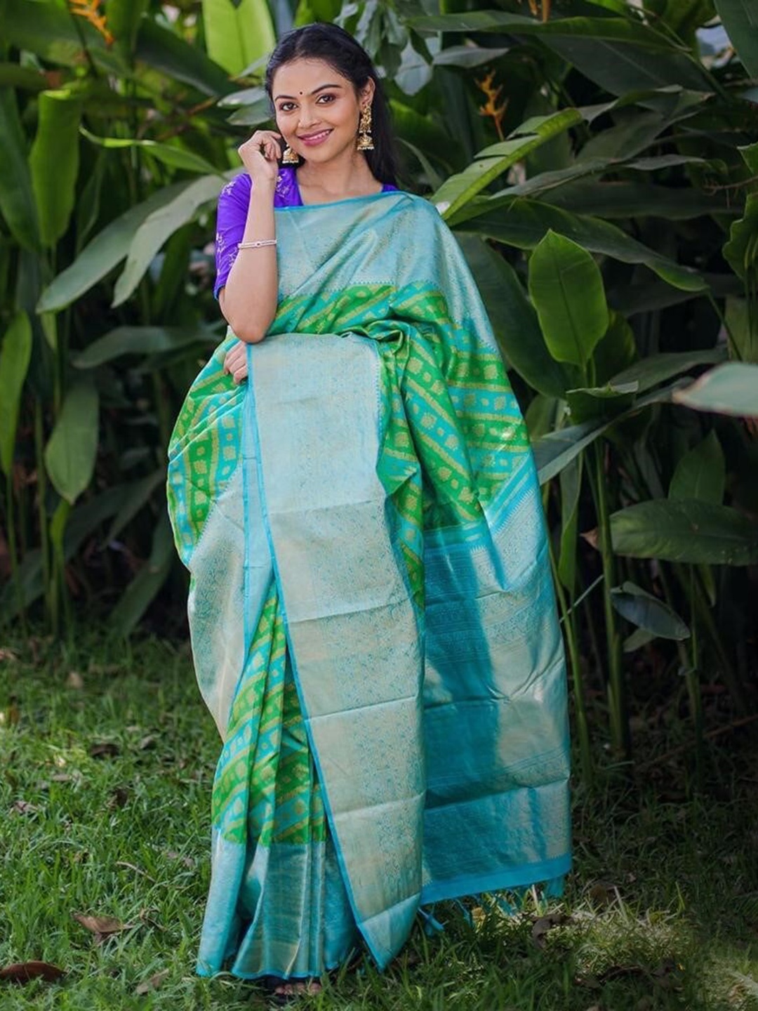 

Mitera Green & Blue Ethnic Motifs Woven Design Zari Art Silk Saree