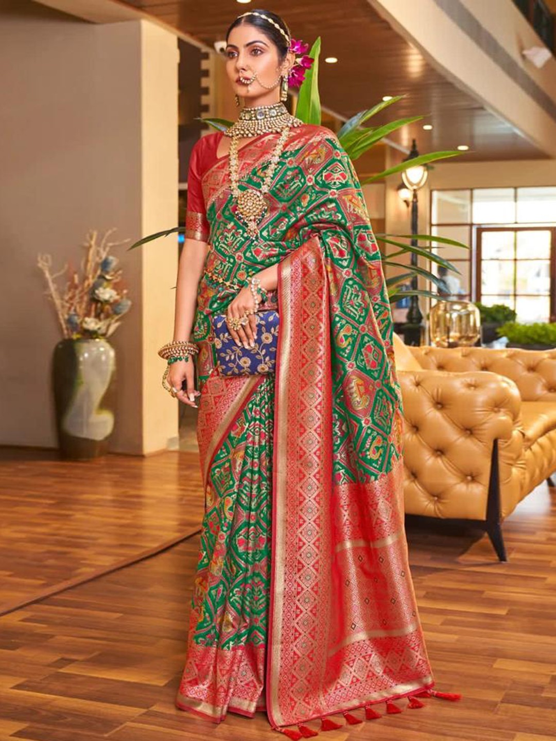 

Mitera Green & Pink Ethnic Motifs Woven Design Zari Art Silk Saree