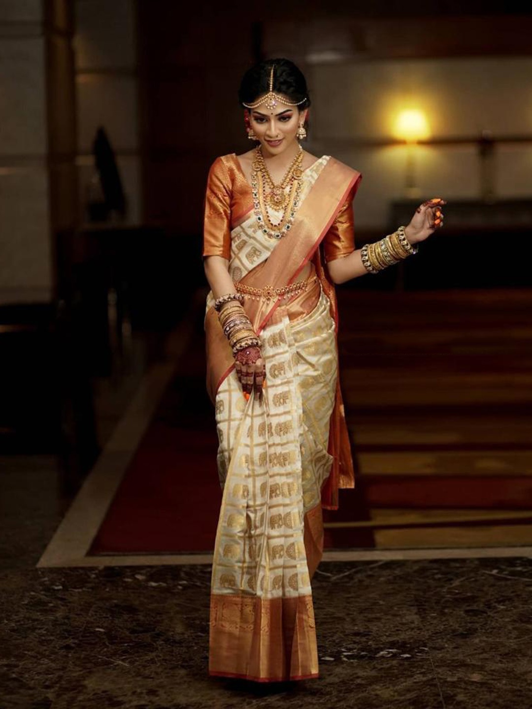 

Mitera White & Maroon Ethnic Motifs Woven Design Zari Saree