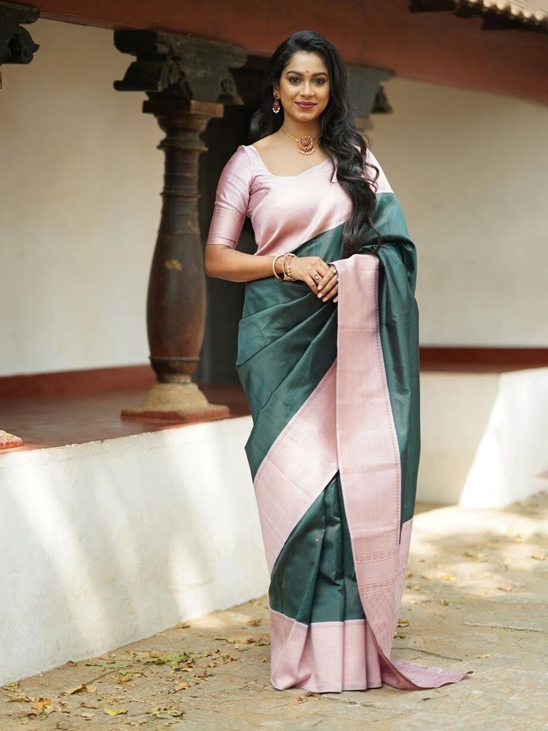 

Mitera Green & Pink Ethnic Motifs Woven Design Zari Art Silk Saree