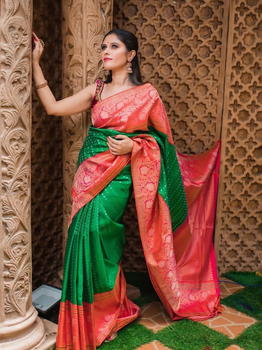 

Mitera Green & Pink Ethnic Motifs Woven Design Zari Art Silk Saree