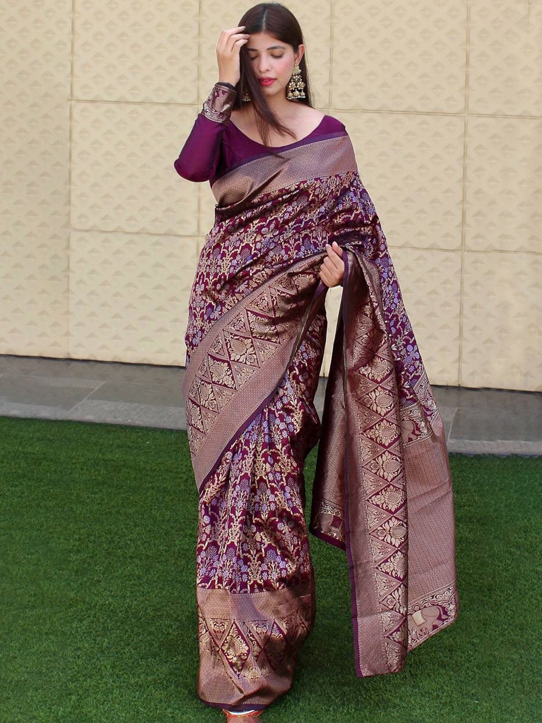 

Mitera Purple & Gold Toned Woven Design Zari Art Silk Saree