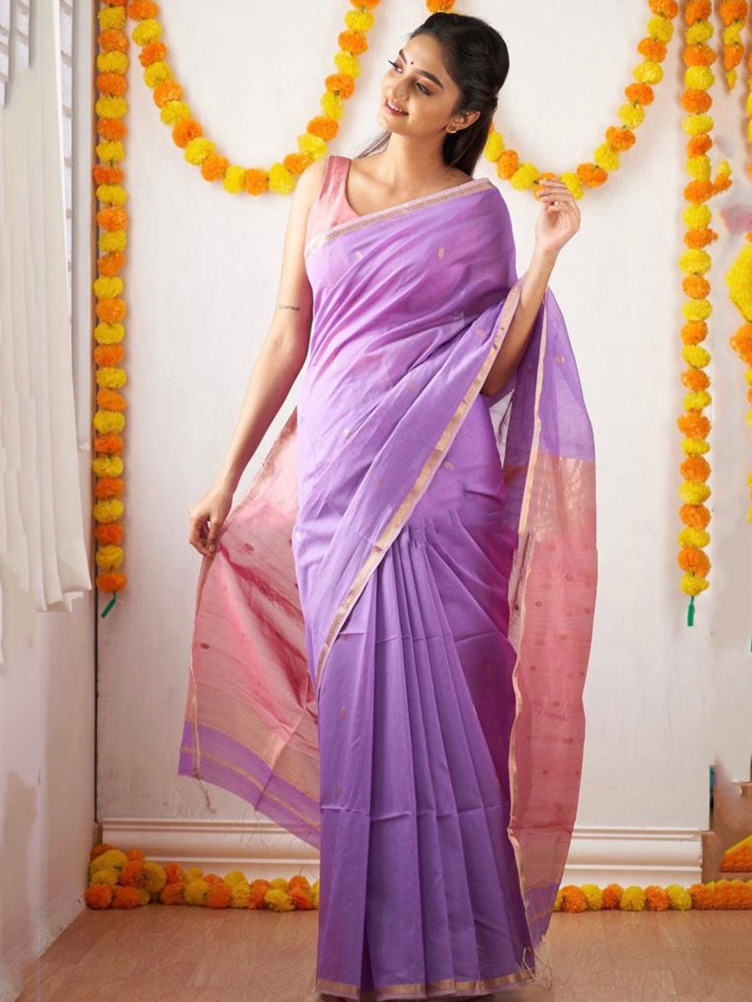 

Mitera Purple & Pink Ethnic Motifs Woven Design Zari Art Silk Saree