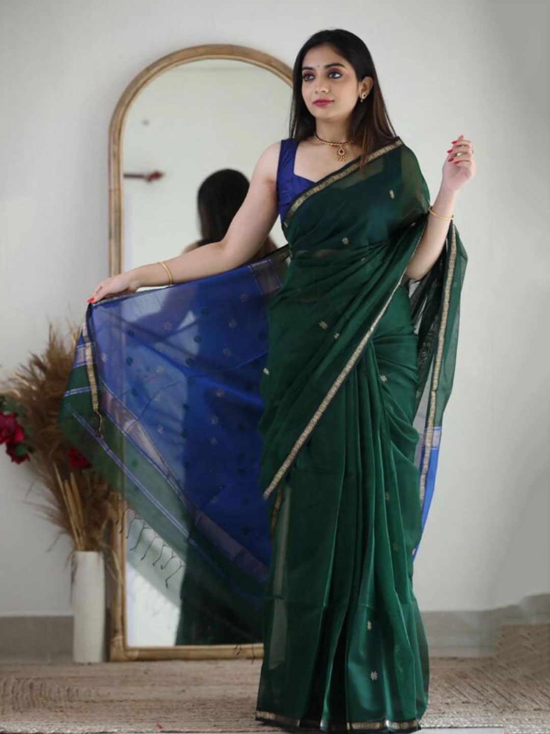 

Mitera Blue & Green Ethnic Motifs Woven Design Zari Art Silk Saree