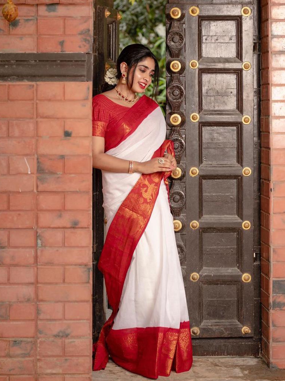 

Mitera Red & White Ethnic Motifs Woven Design Zari Art Silk Saree