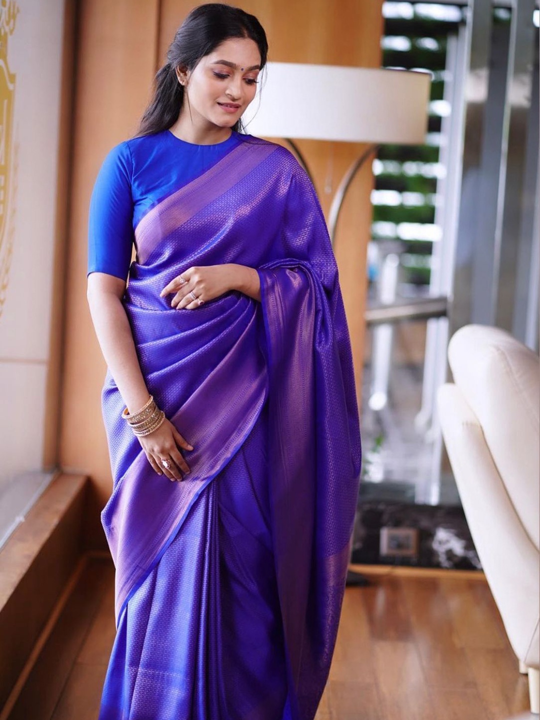 

Mitera Blue & Silver-Toned Ethnic Motifs Woven Design Zari Art Silk Saree