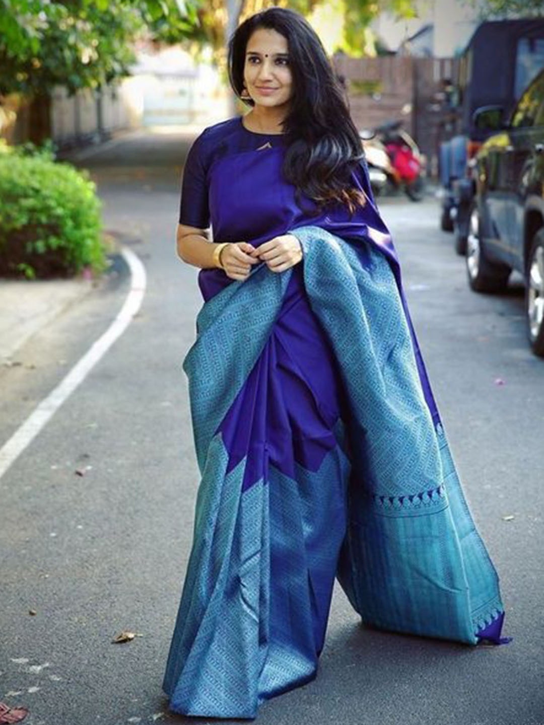 

Mitera Navy Blue & Silver Toned Zari Art Silk Saree