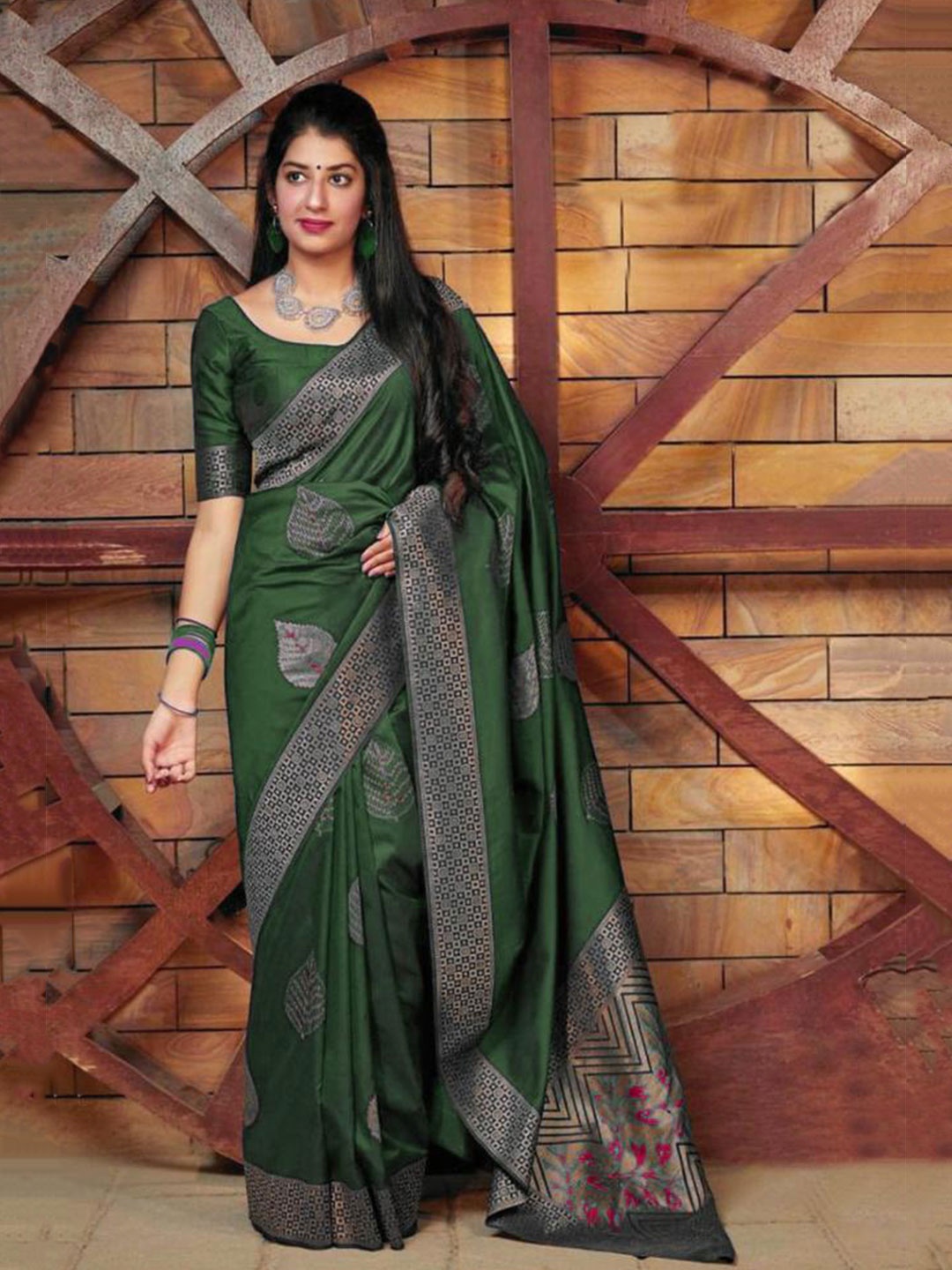 

Mitera Green & Gold Toned Ethnic Motifs Zari Art Silk Saree