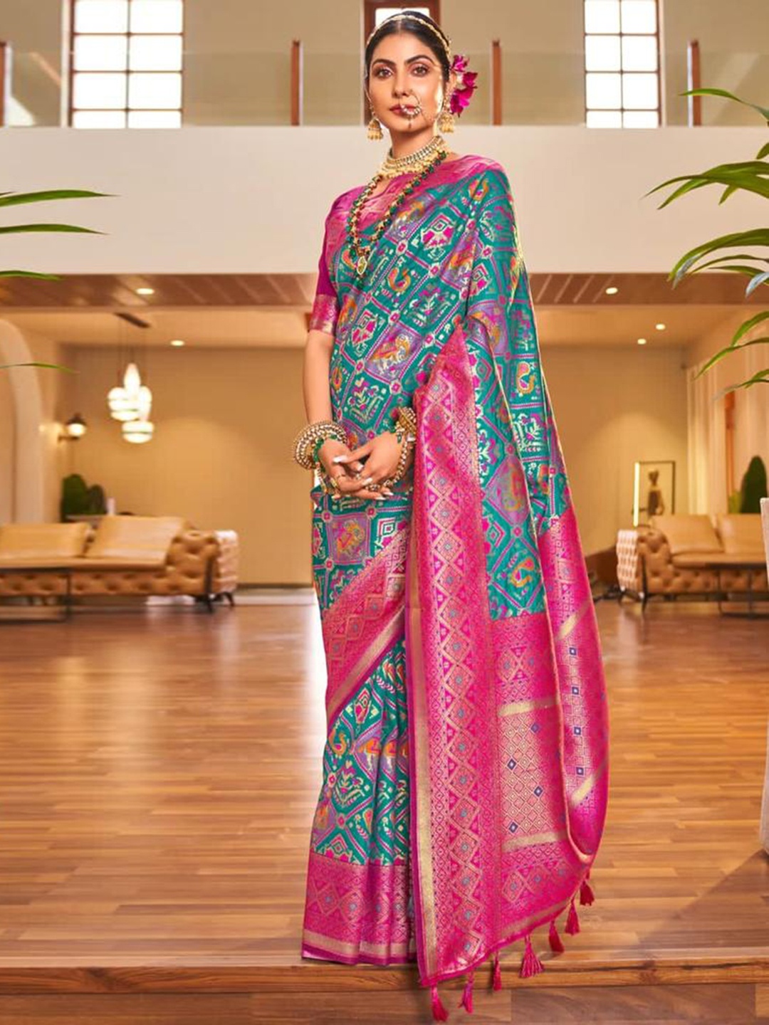 

Mitera Blue & Pink Ethnic Motifs Woven Design Zari Art Silk Saree
