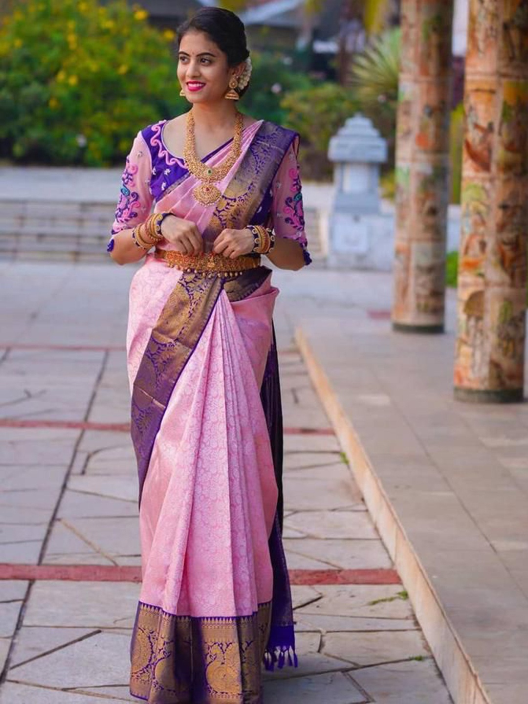 

Mitera Pink & Blue Ethnic Motifs Woven Design Zari Art Silk Saree