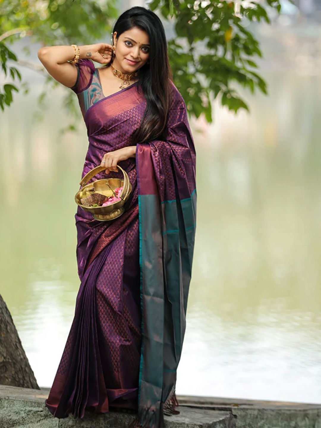 

Mitera Purple & Green Woven Design Zari Art Silk Saree