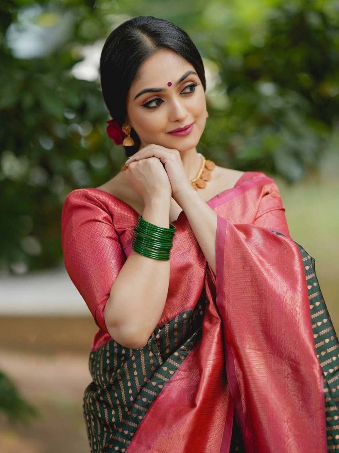 

Mitera Green & Pink Woven Design Zari Art Silk Saree