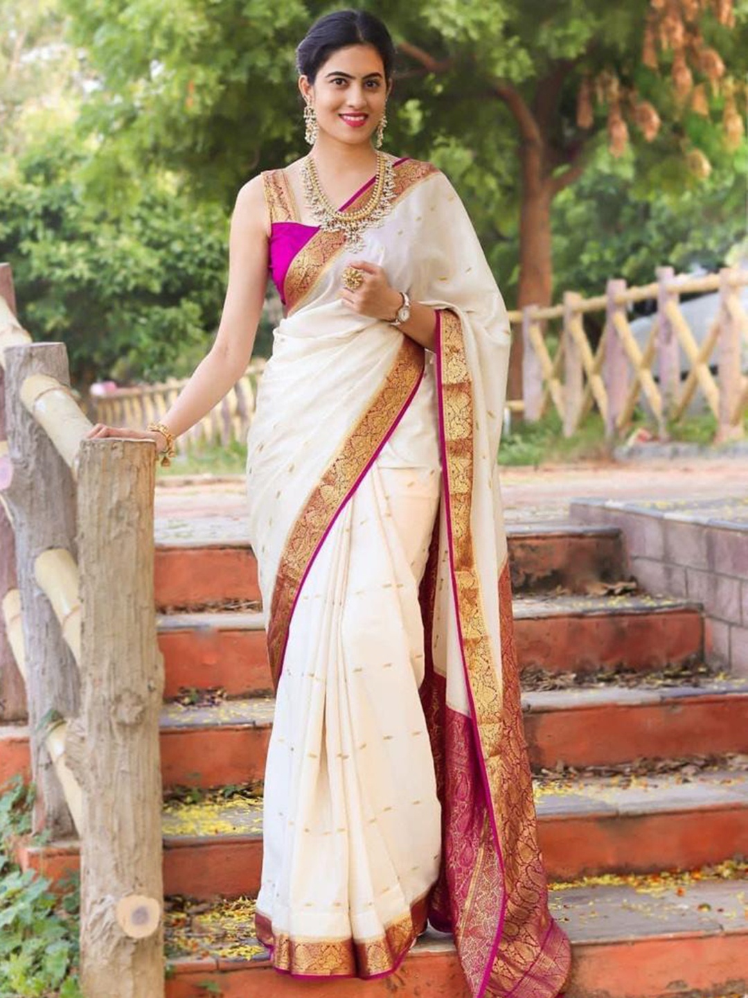 

Mitera White & Purple Ethnic Motifs Woven Design Zari Art Silk Saree
