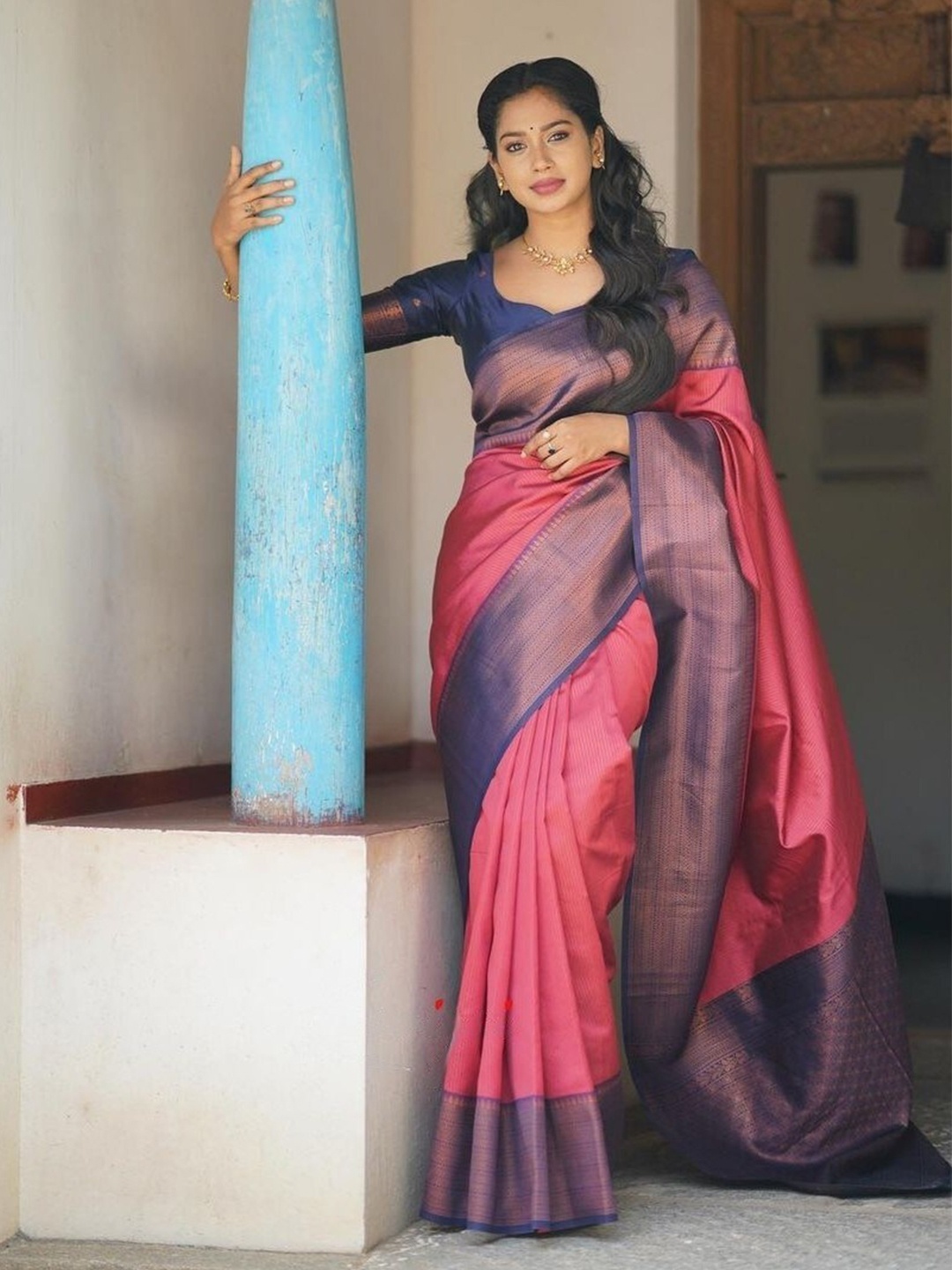

Mitera Pink & Blue Ethnic Motifs Woven Design Zari Art Silk Saree