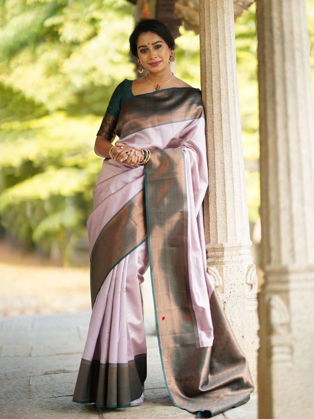 

Mitera Pink & Green Woven Design Zari Art Silk Saree