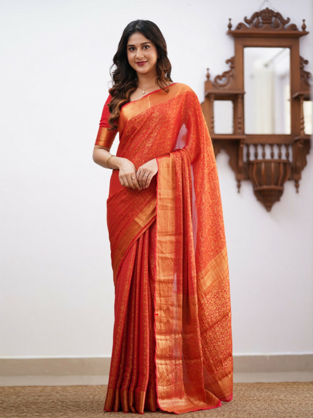 

Mitera Red & Gold Toned Ethnic Motifs Zari Art Silk Saree