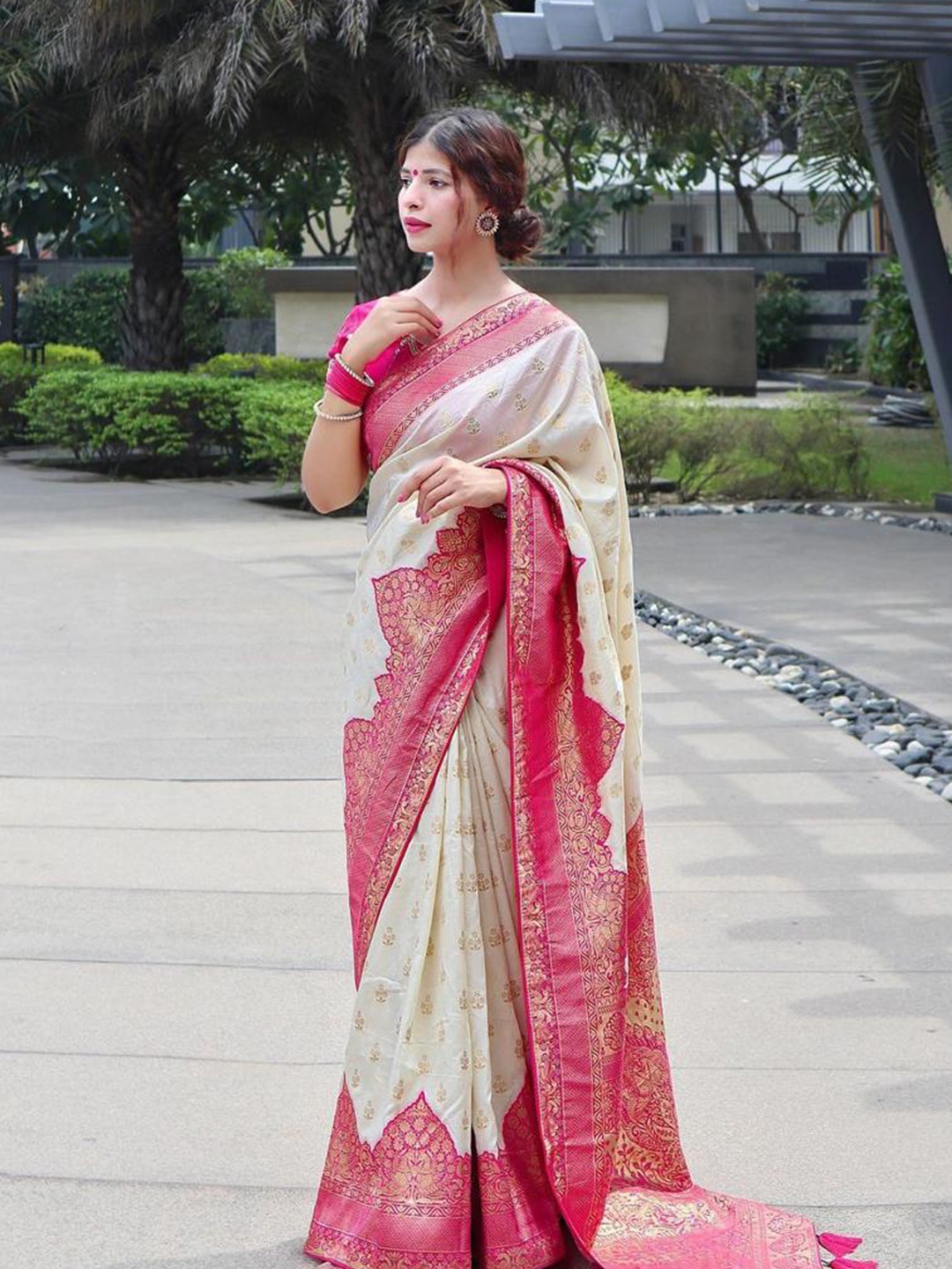 

Mitera White & Magenta Woven Design Zari Art Silk Saree