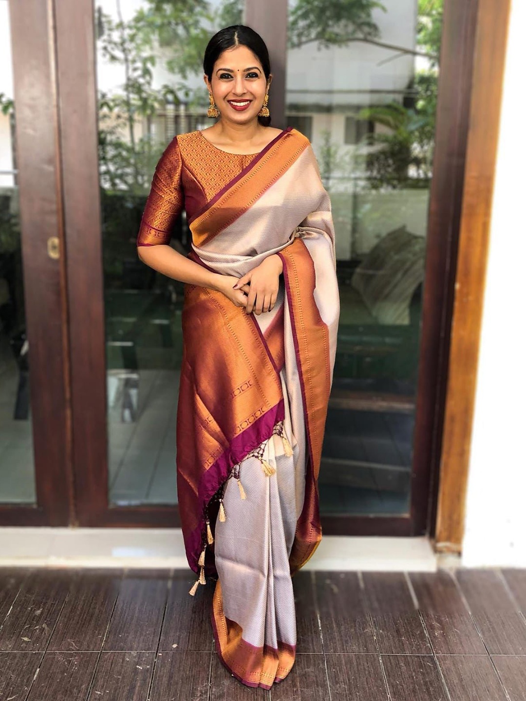 

Mitera Lavender & Burgundy Woven Design Zari Art Silk Saree