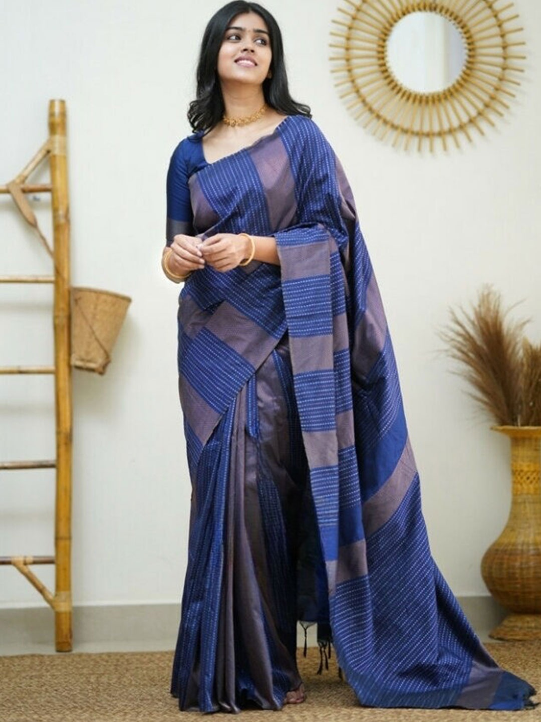 

Mitera Blue & Silver-Toned Ethnic Motifs Woven Design Zari Art Silk Saree