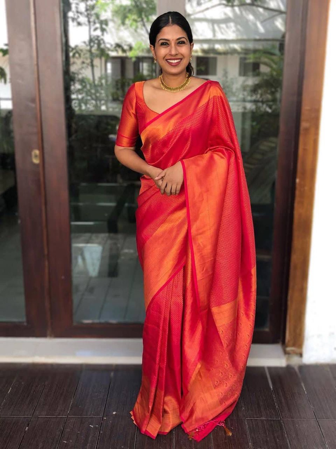 

Mitera Red & Gold-Toned Ethnic Motifs Woven Design Zari Art Silk Saree