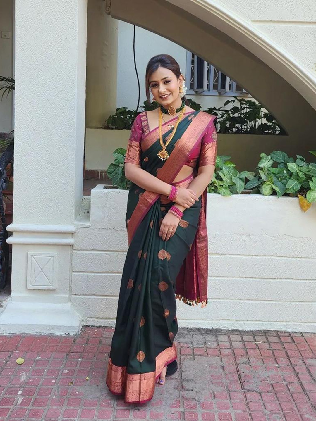 

Mitera Green & Pink Woven Design Zari Art Silk Saree