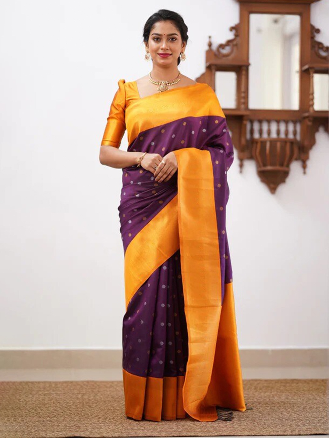 

Mitera Purple & Yellow Ethnic Motifs Woven Design Zari Art Silk Saree