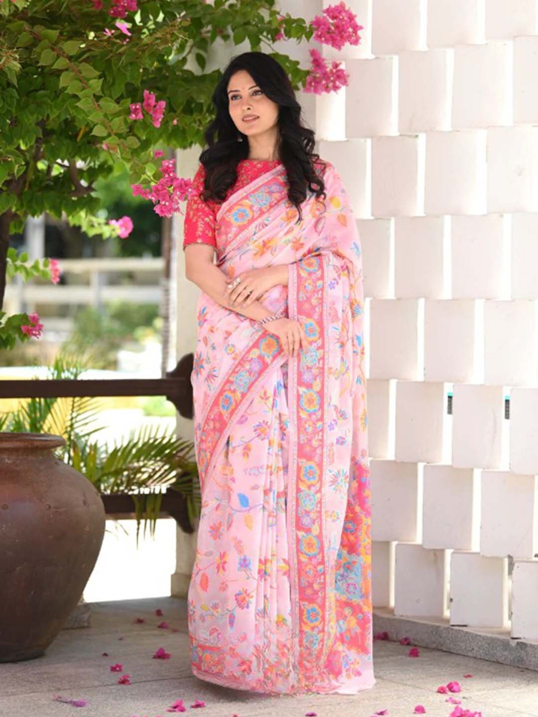 

Mitera Pink & Blue Ethnic Motifs Woven Design Zari Art Silk Saree