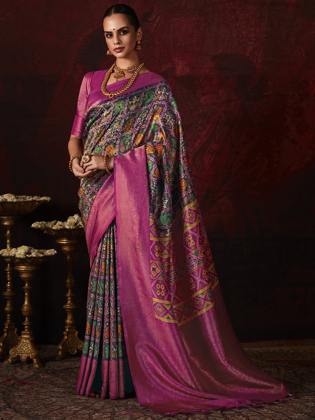 

Mitera Green & Pink Ethnic Motifs Zari Silk Pochampally Saree