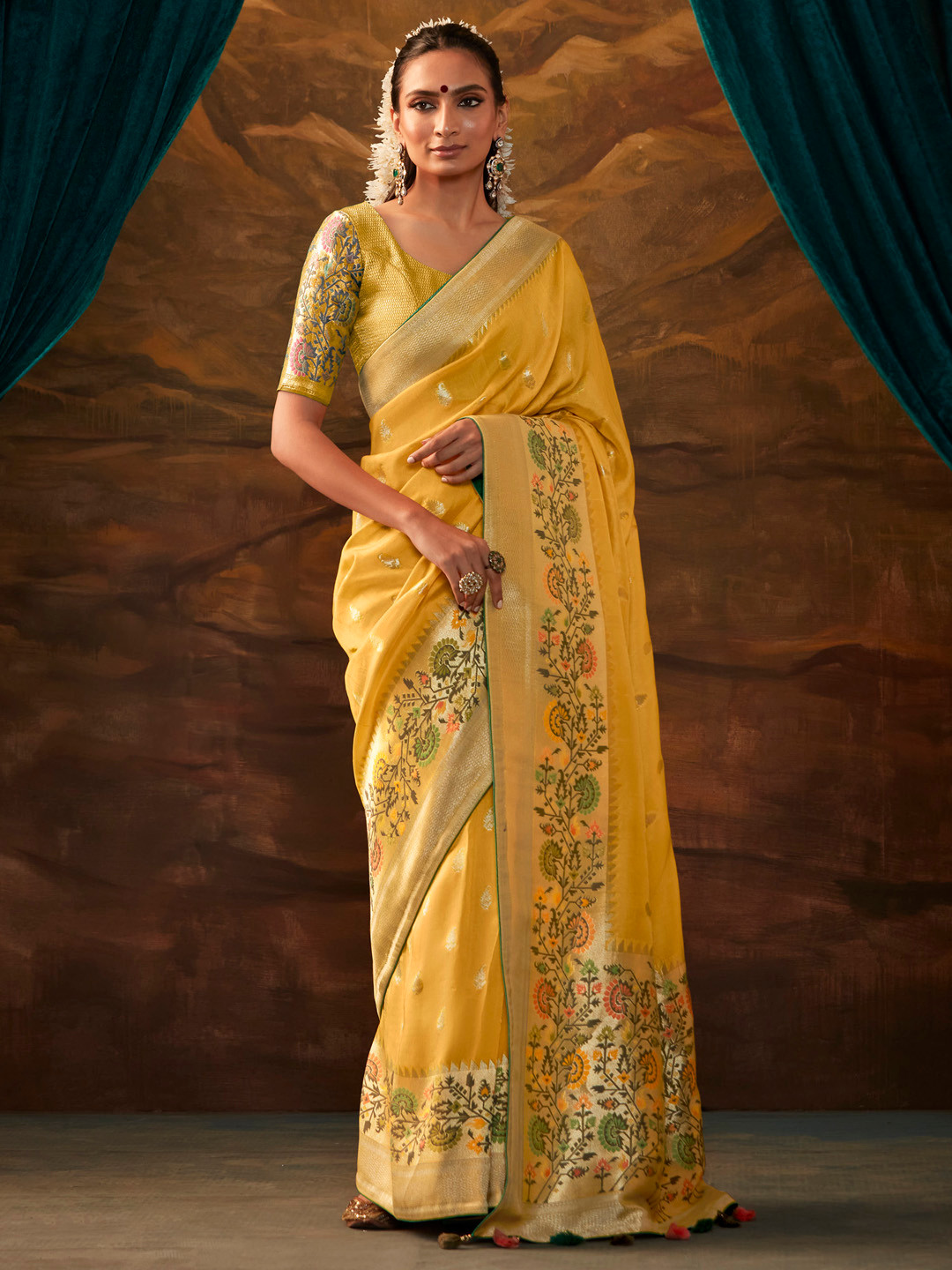 

Mitera Yellow & Green Ethnic Motifs Zari Silk Banarasi Saree