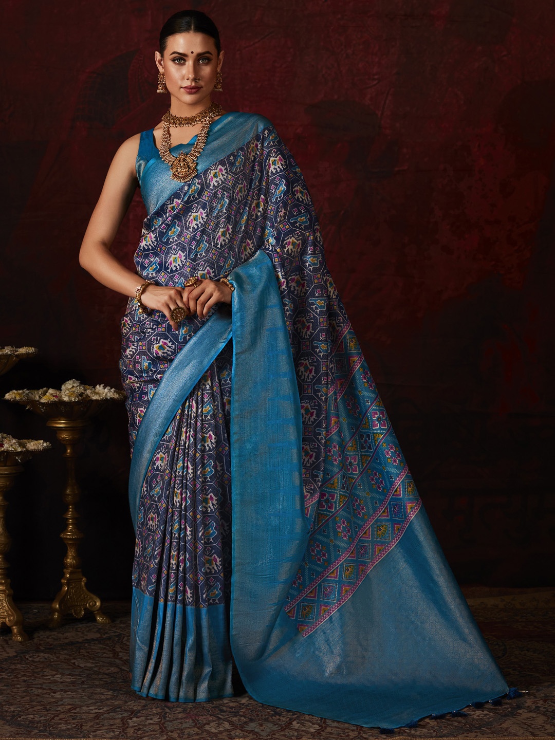 

Mitera Navy Blue & White Ethnic Motifs Zari Pochampally Saree