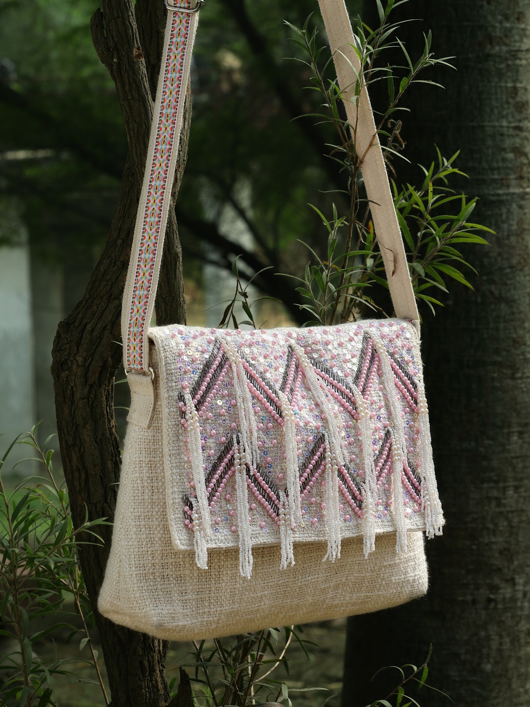 

Anekaant Embellished Lace Sling Bag with Tasselled, Off white