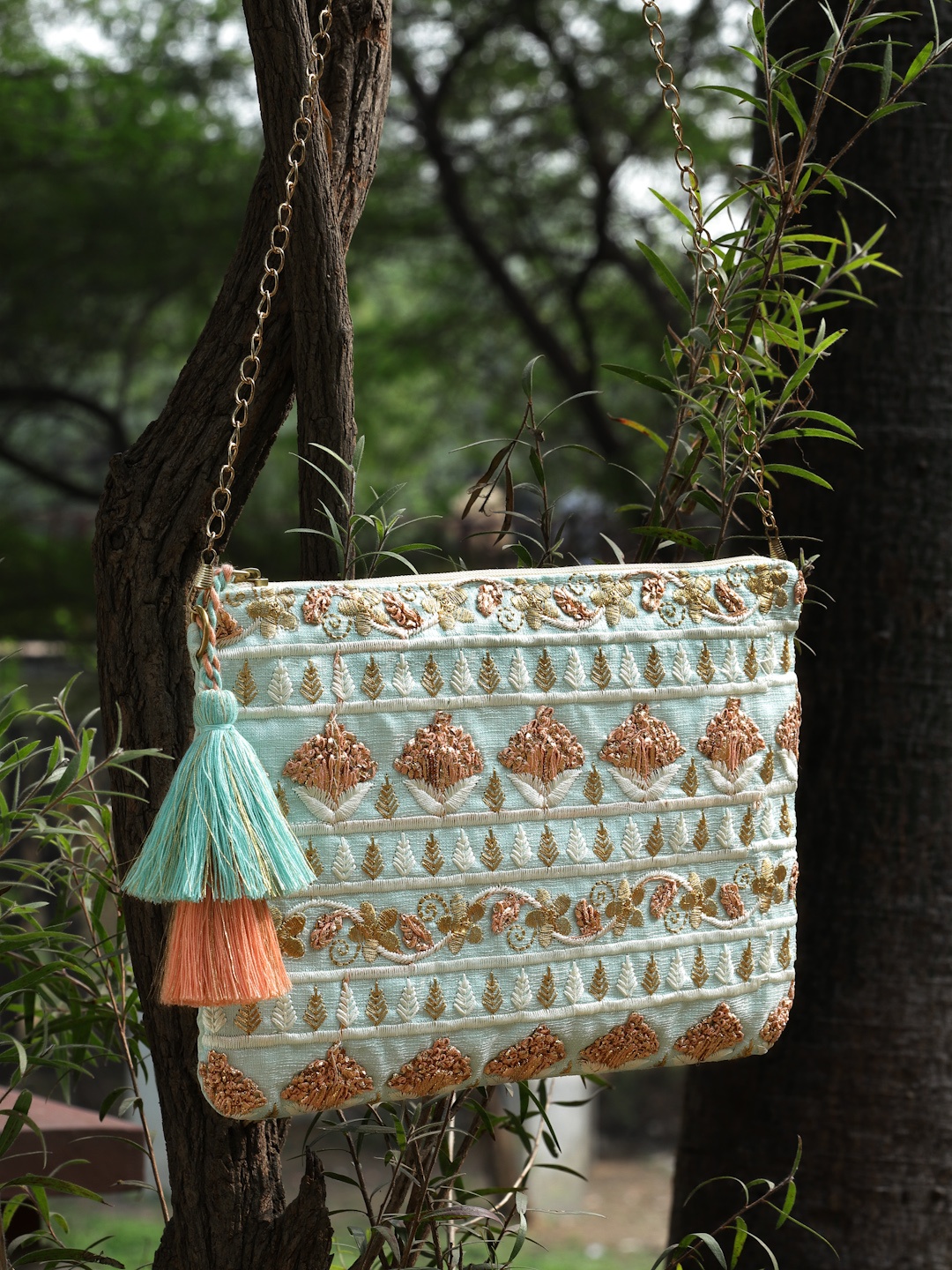 

Anekaant Floral Embroidered Faux Silk Sling Bag With Tasseled, Blue